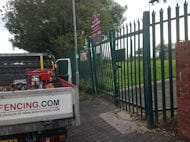Green powder-coated palisade gates